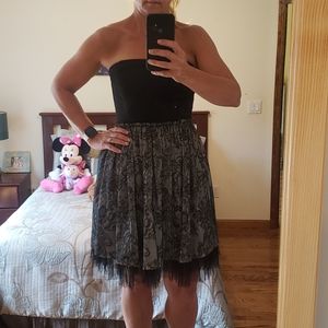 Aqua strapless black dress with lace bottom.